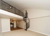 Thumbnail 14 of 24 - the loft of a home with a spiral staircase at Retro 511 Apartments, Connecticut 06516