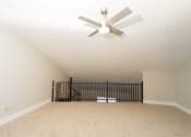 Thumbnail 18 of 24 - the spacious living room with a ceiling fan in a new home at Retro 511 Apartments, West Haven, Connecticut