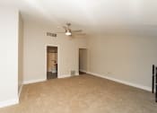 Thumbnail 19 of 24 - an empty living room with a ceiling fan at Retro 511 Apartments, West Haven