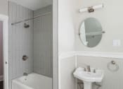 Thumbnail 41 of 55 - Bathroom sink and tub at The Packard, West Hartford, CT, 06119