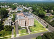 Thumbnail 1 of 55 - an aerial view of an apartment building in a city at The Packard, Connecticut, 06119