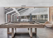 Thumbnail 6 of 41 - a billiards table in the lobby of an office building at Up House, Farmington, 06032