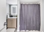 Thumbnail 9 of 41 - a bathroom with a shower curtain and a sink at Up House, Farmington, Connecticut