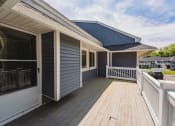 Thumbnail 20 of 33 - a house with a deck and a blue roof at Woodbury, Woodbury, CT, 06798