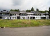 Thumbnail 33 of 33 - a large apartment building on a grassy hillat Woodbury, Woodbury, CT, 06798