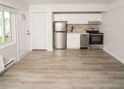 Thumbnail 29 of 33 - Kitchen and living room at Woodbury, Woodbury, CT