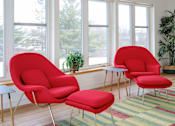 Thumbnail 13 of 14 - Three red chairs are placed in front of a window.