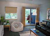 Thumbnail 2 of 15 - a living room with a couch and a chair and a sliding glass door
