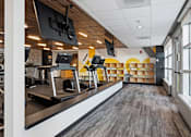 Thumbnail 66 of 151 - A gym with treadmills and exercise equipment.
