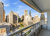 Thumbnail 93 of 151 - A cityscape viewed from a balcony.
