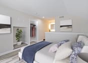 Thumbnail 11 of 32 - a bedroom with a bed and a closet