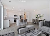 Thumbnail 8 of 46 - A modern kitchen and living room with a C2-STYLE designation.