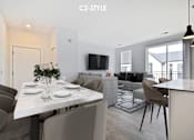 Thumbnail 9 of 46 - A modern dining room with a white table and chairs.