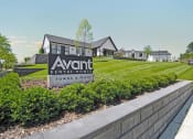 Thumbnail 40 of 46 - a view of the avanti rental homes sign in front of a grassy yard