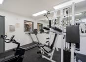 Thumbnail 20 of 40 - apartment fitness center with weight and cardio equipment