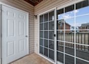 Thumbnail 15 of 23 - A white door is on the left and a glass door is on the right.