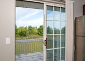 Thumbnail 6 of 29 - A glass door with a handle is open.
