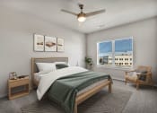 Thumbnail 3 of 32 - a bedroom with a bed and a ceiling fan
