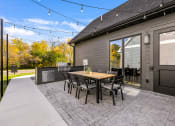 Thumbnail 26 of 30 - Edgewater on Cook Lake Clubhouse Outdoor Patio