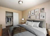 Thumbnail 5 of 10 - a bedroom with a bed and a closet
