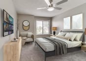 Thumbnail 4 of 30 - a bedroom with a bed and a ceiling fan