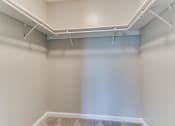 Thumbnail 7 of 30 - the preserve at ballantyne commons empty storage room with white walls and white pipes