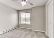 Thumbnail 12 of 30 - an empty room with white walls and a window