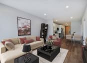 Thumbnail 5 of 38 - a living room with a couch and a coffee table