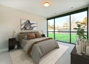 Thumbnail 7 of 38 - a bedroom with a bed and a large window