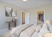 Thumbnail 20 of 38 - a bedroom with a large bed and a closet