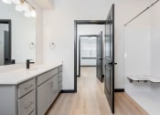 Thumbnail 19 of 29 - bathroom with sink and shower with bench