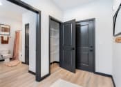 Thumbnail 18 of 29 - apartment entrance with closet and bathroom