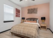 Thumbnail 7 of 29 - bedroom with a bed and nightstands