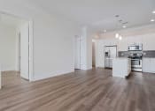 Thumbnail 5 of 40 - a kitchen and living room in a 555 waverly unit