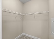 Thumbnail 10 of 42 - A white closet with a white shelf and a white door.
