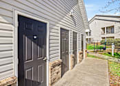 Thumbnail 40 of 42 - A row of houses with dark grey doors.
