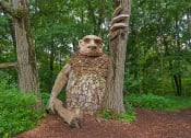 Thumbnail 37 of 38 - a statue of a man in the woods