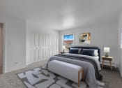 Thumbnail 14 of 38 - a bedroom with a large bed in a room