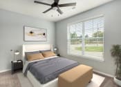 Thumbnail 22 of 23 - a bedroom with a bed and a ceiling fan
