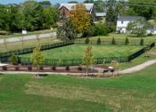 Thumbnail 13 of 27 - an aerial view of a park with a baseball field and trees