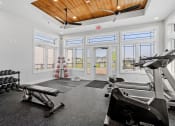 Thumbnail 4 of 10 - the gym with windows and exercise equipment at 1861 muleshoe drive