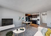 Thumbnail 1 of 26 - a living room with a couch and a table