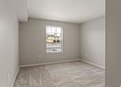 Thumbnail 43 of 43 - A room with a carpeted floor and a window.