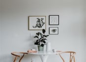 Thumbnail 13 of 43 - a table and two chairs in a room