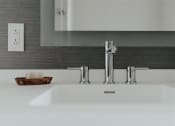 Thumbnail 33 of 43 - a sink with a faucet and a bowl with a candle on it