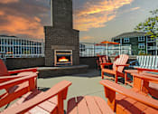 Thumbnail 19 of 21 - the fire pit on the patio at sunset at the resort at governors crossing
