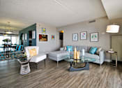 Thumbnail 1 of 41 - a living room with a couch and a table