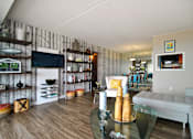 Thumbnail 2 of 41 - a living room with a couch and a table