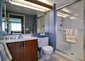 Thumbnail 8 of 41 - a bathroom with a toilet sink and shower