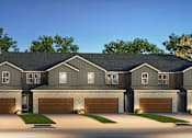 Thumbnail 41 of 44 - A large, two-story house with a dark grey exterior and a black roof.